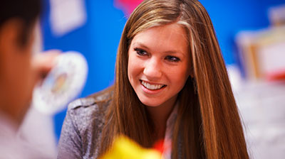 One of our Behavior Therapists, Kristin, working with a child.